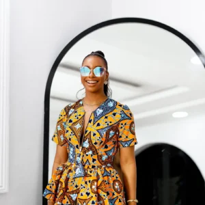 dunni african print front zip peplum top [yellow]